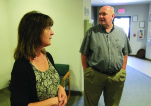 Stan Gilbert, executive director of Klamath Youth Development Center, and Chris Eddy, licensed clinical social worker with Phoenix Place, the county’s only respite and residential mental health care facility, provide a tour of the facility. 