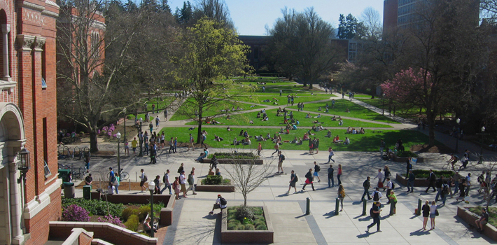 Students hurry to and from classes at the University of Oregon in Eugene.